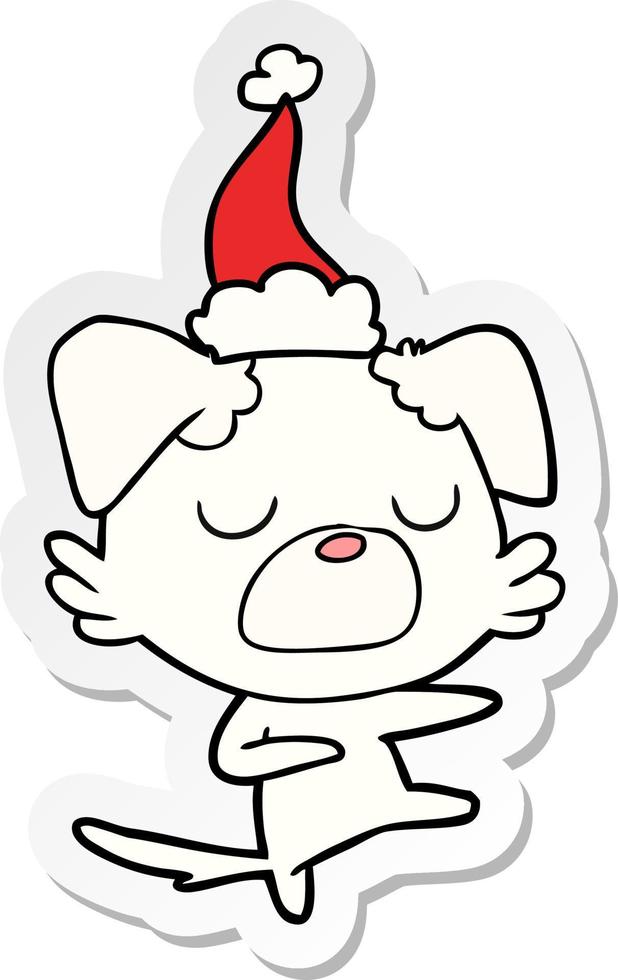 sticker cartoon van een hond met een kerstmuts vector