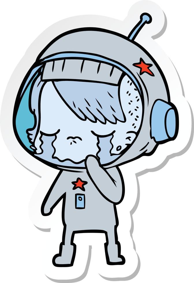 sticker van een cartoon huilend astronautenmeisje vector