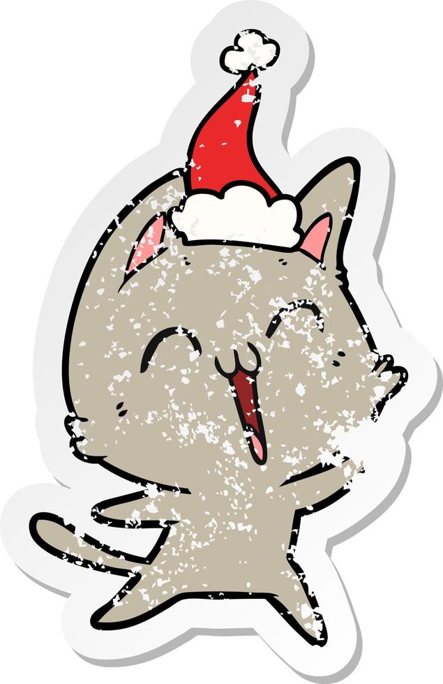 vrolijke, verontruste stickercartoon van een kat met een kerstmuts vector