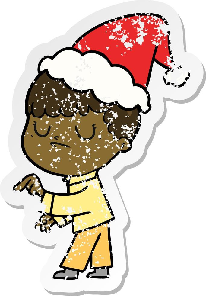 verontruste sticker cartoon van een knorrige jongen die een kerstmuts draagt vector