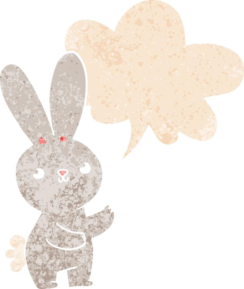 schattig cartoon konijn en tekstballon in retro getextureerde stijl vector