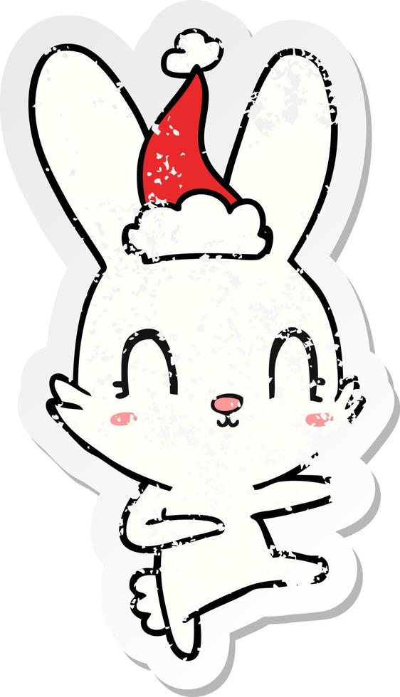 schattig verontrust sticker tekenfilm van een konijn dansen vervelend de kerstman hoed vector