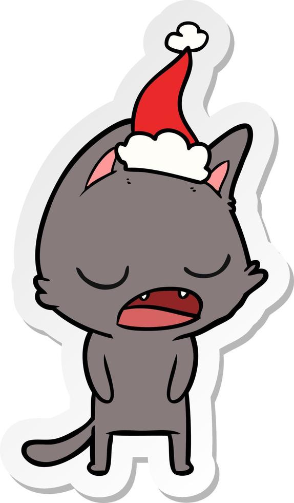 pratende kat sticker cartoon van een dragende kerstmuts vector