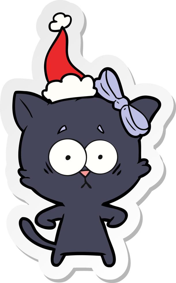 sticker cartoon van een kat met een kerstmuts vector