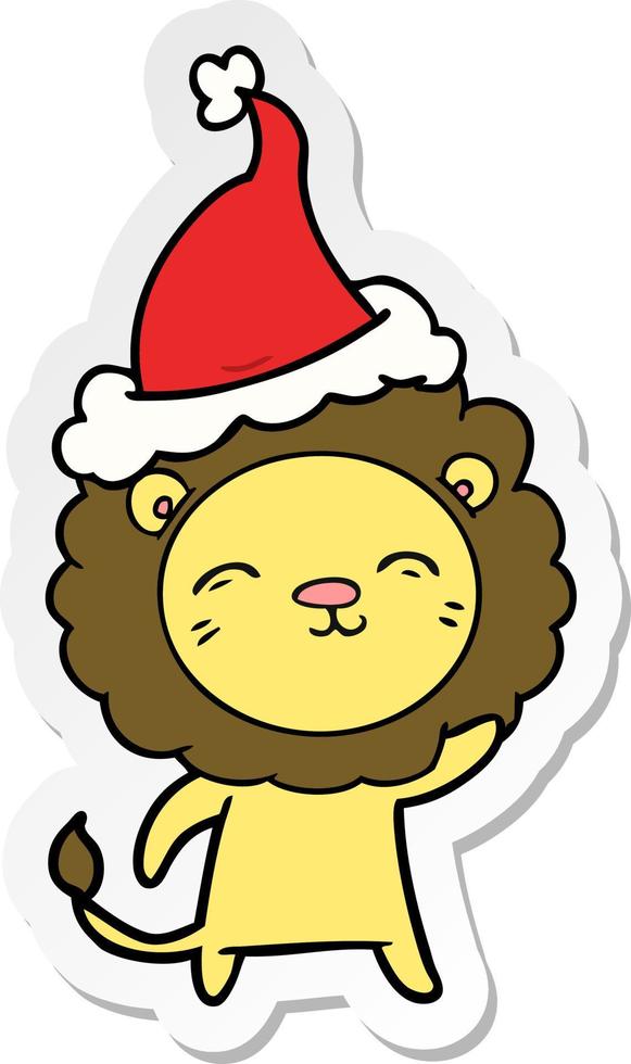 sticker cartoon van een leeuw met een kerstmuts vector