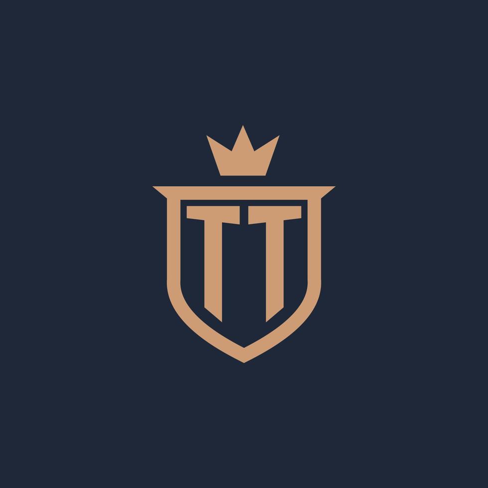 tt monogram eerste logo met schild en kroon stijl vector