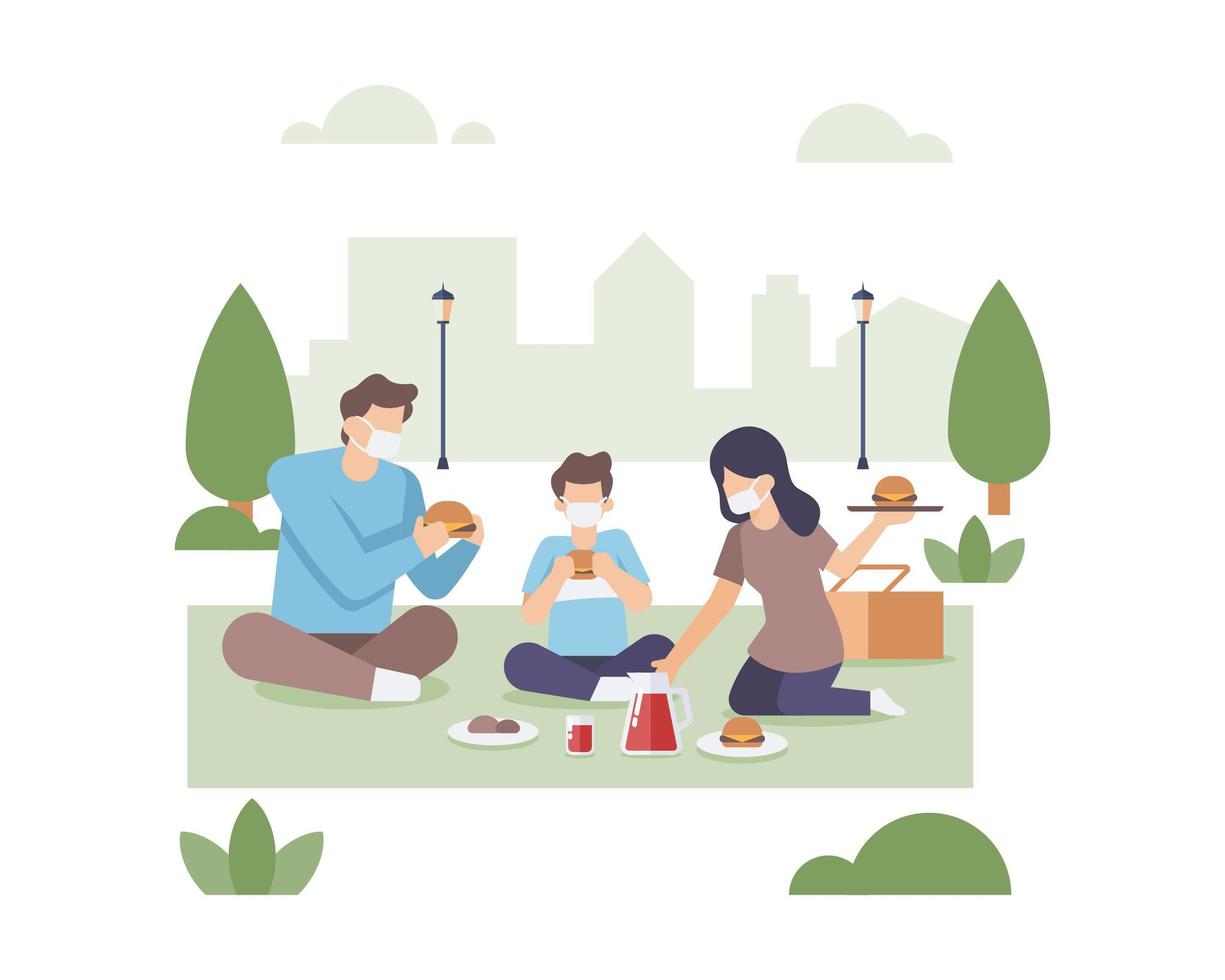 gezin met gezichtsmaskers die samen eten in het park vector