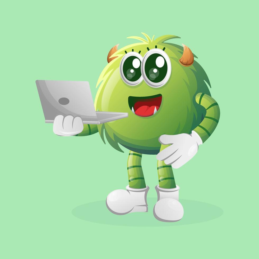 schattig groen monster werken gebruik makend van een laptop vector