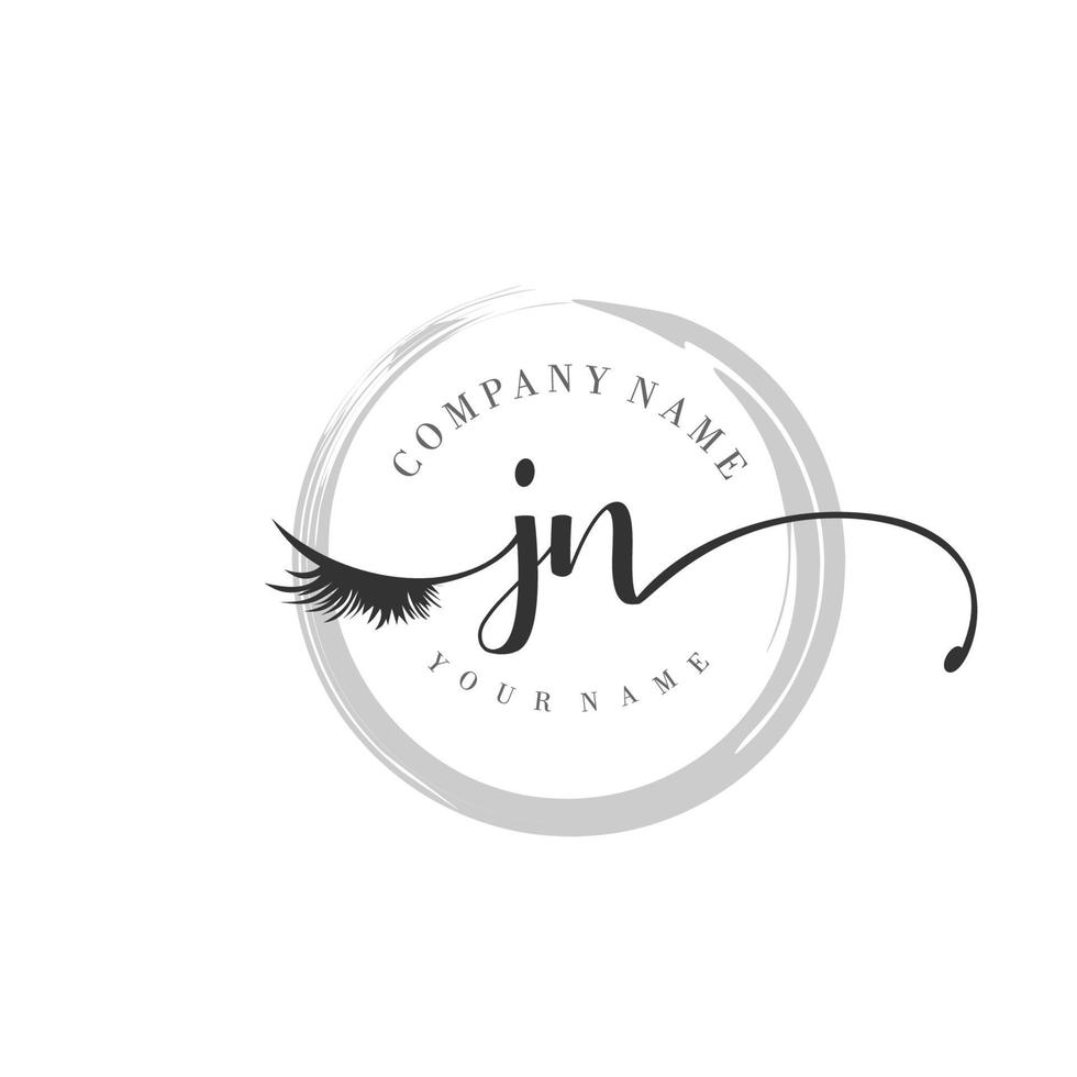 eerste jn logo handschrift schoonheid salon mode modern luxe monogram vector