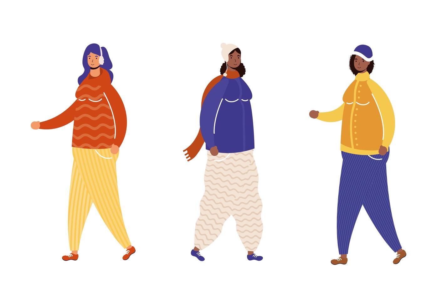 interraciale vrouwengroep die karakters van winterkleren draagt vector