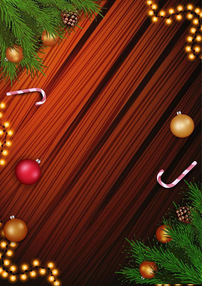 Kerstmissjabloon voor uw kunsten met exemplaarruimte, slinger, kerstboomtak en suikergoedriet op de houten achtergrond vector