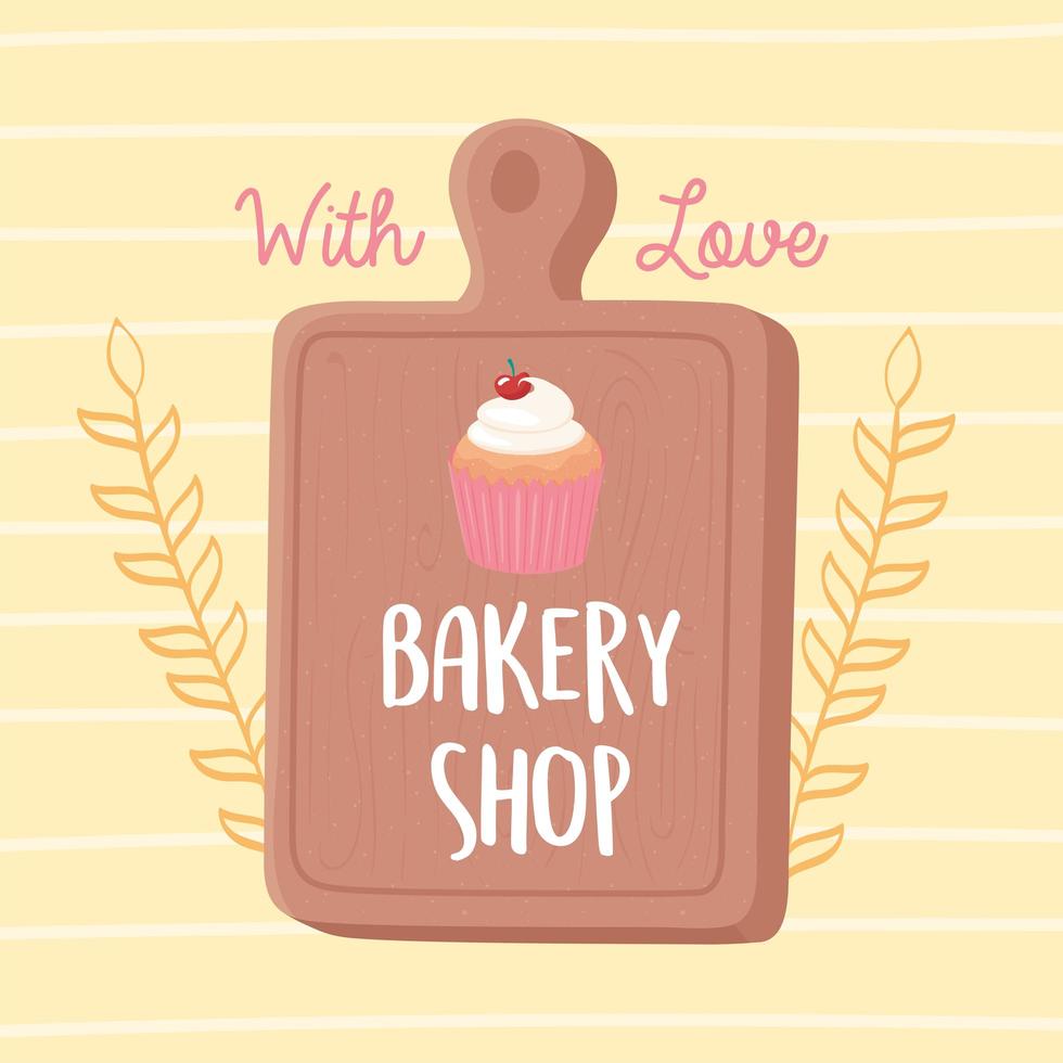 bakkerij winkel cupcake en snijplank embleem icoon vector