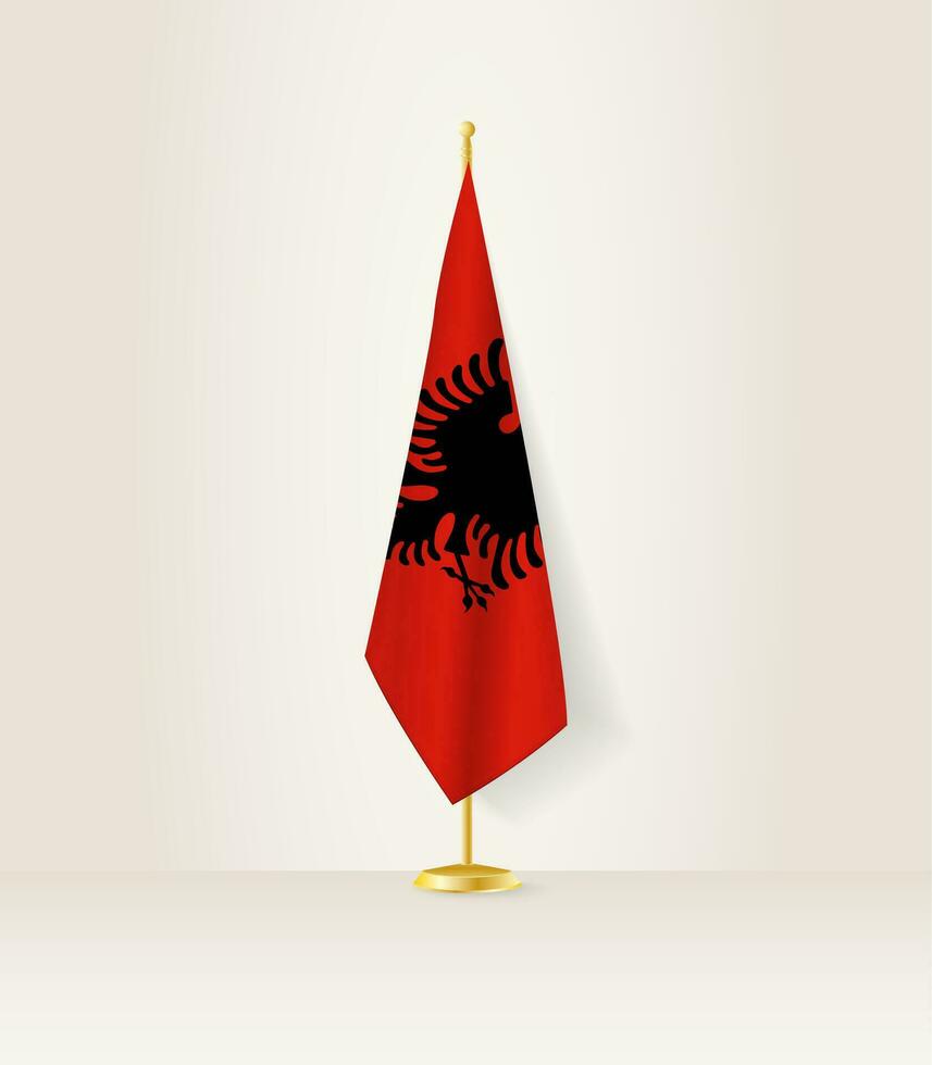 Albanië vlag Aan een vlag stellage. vector