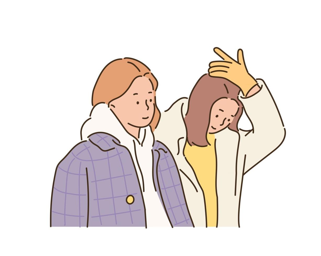 twee vrouwen in winterjassen. handgetekende stijl vectorontwerpillustraties. vector