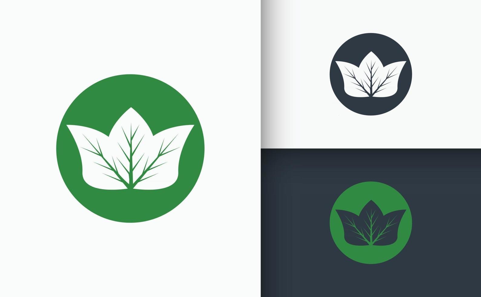 natuurlijk logo-ontwerp groen en zwart blad vector