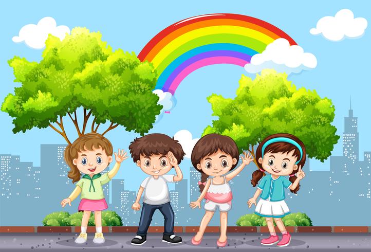 Gelukkige kinderen in het park met regenboog in hemel vector