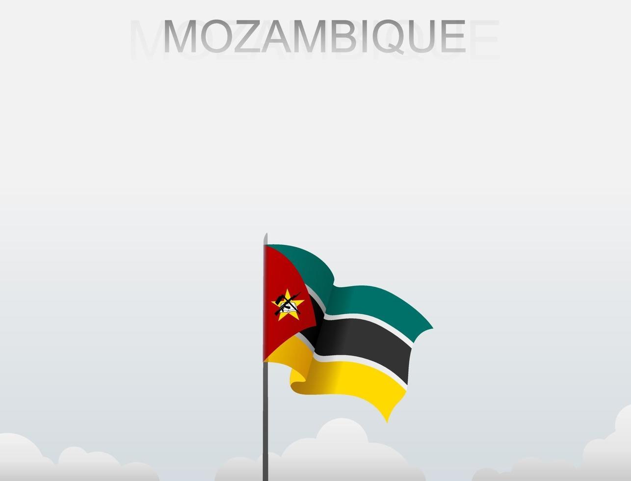 vlag van mozambique die onder de witte hemel vliegt vector