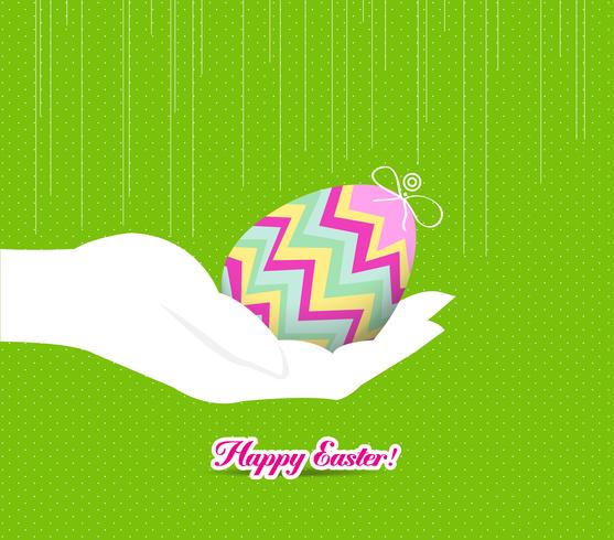 gelukkige Pasen-hand die een ei houdt vector