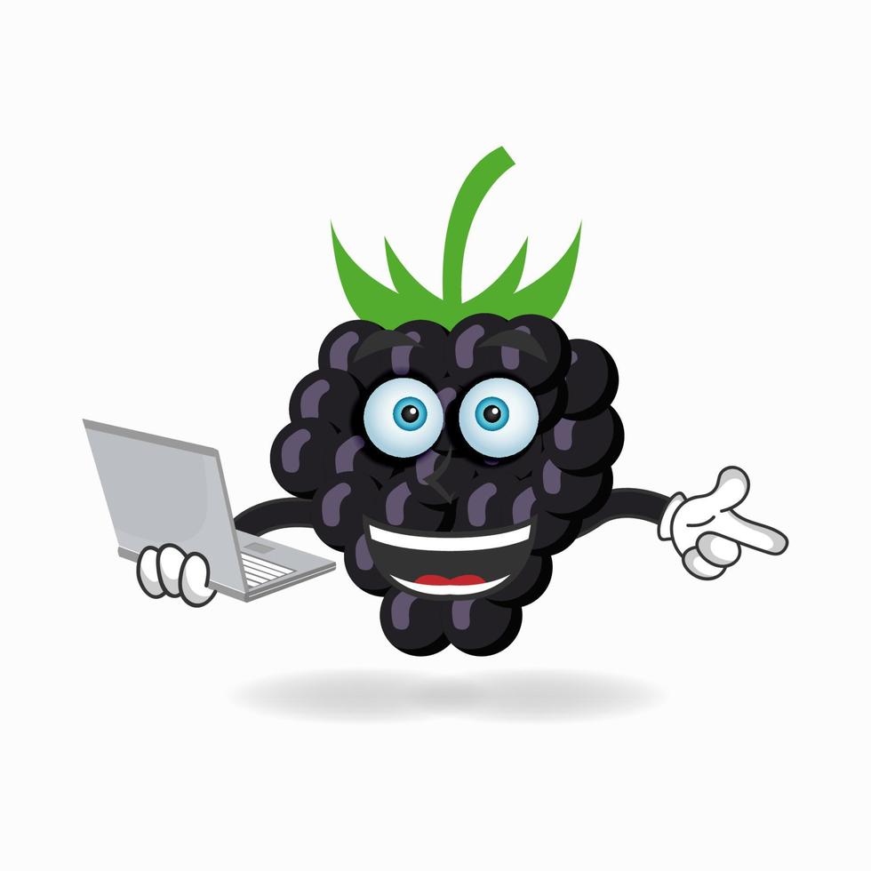 druif mascotte karakter met laptop in de rechterhand. vector illustratie