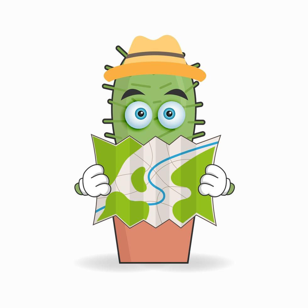 het karakter van de cactusmascotte houdt een kaart vast. vector illustratie