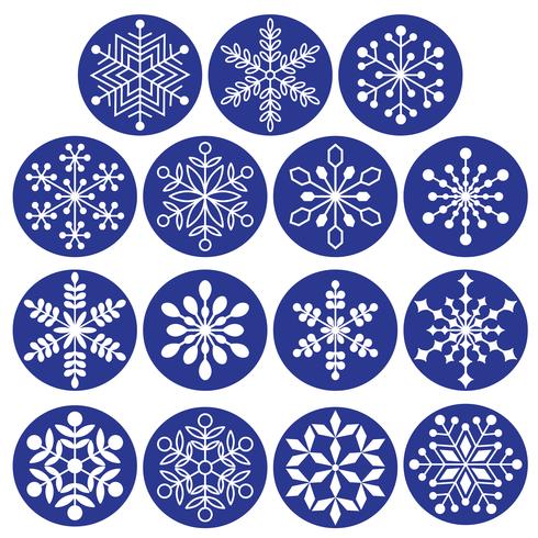 witte sneeuwvlokken op donkerblauwe cirkels vector