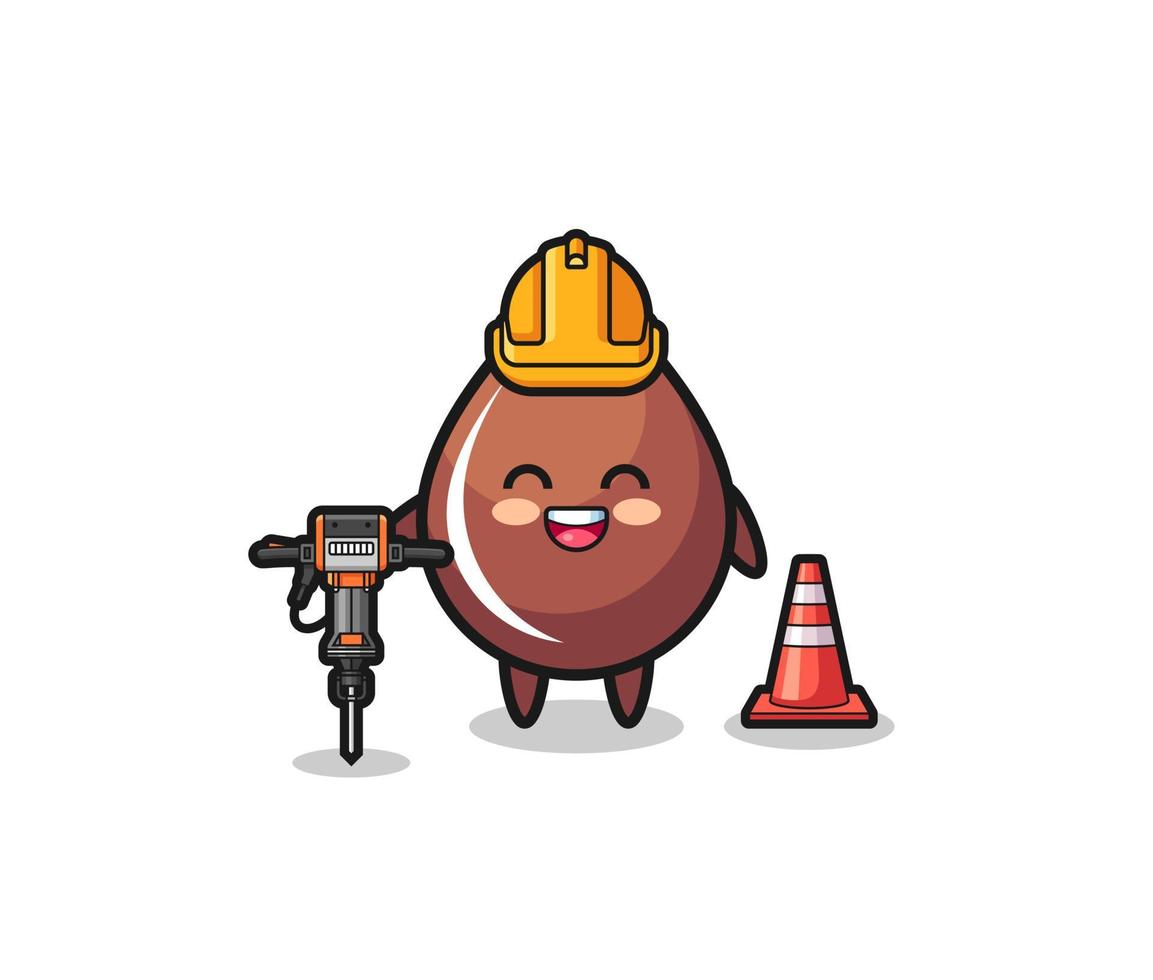 wegwerker mascotte van chocoladedruppel met boormachine vector