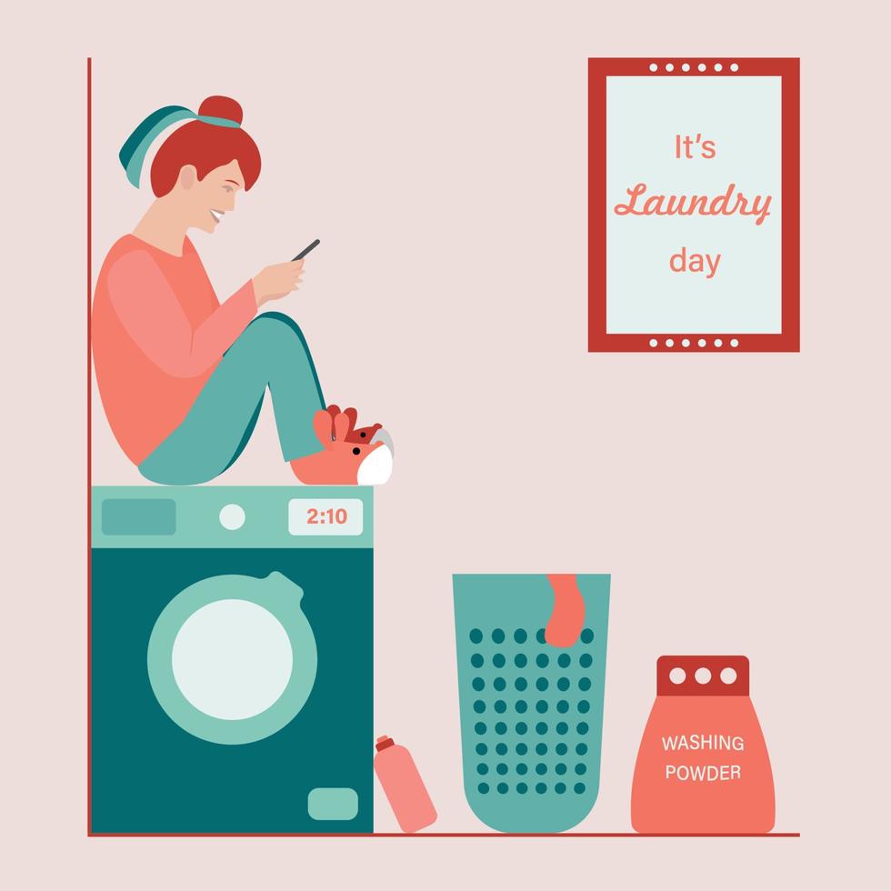 gelukkige vrouw die de was doet. vrouw zittend op de wasmachine met smartphone in handen. poster aan de muur het is wasdag. waspoeder, wasmand en wasverzachter staan op vloer. vector