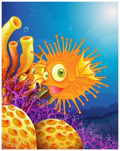 Een oranje kogelvis dichtbij de koraalriffen vector