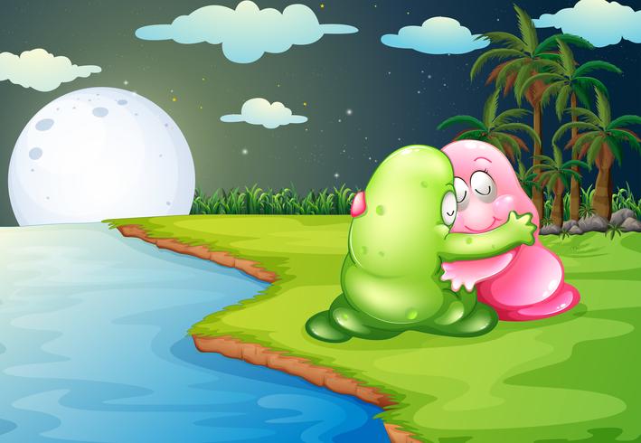 Een groen monster dat het roze monster troost bij de rivieroever vector