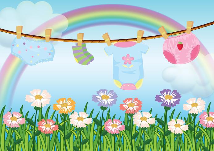 Een tuin met hangende babykleding vector