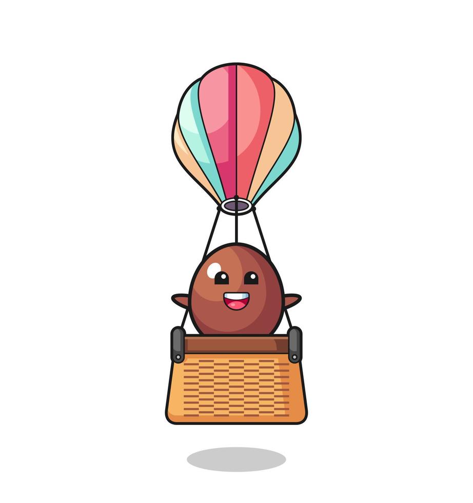 chocolade-ei-mascotte in een heteluchtballon vector