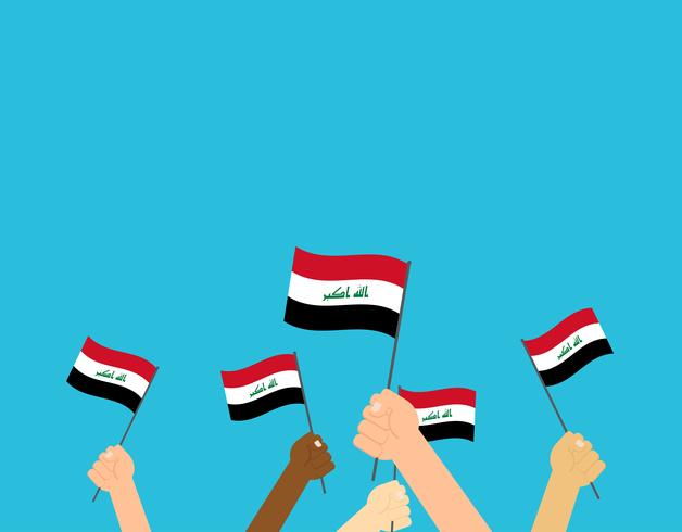 Vectorillustratiehands die de vlaggen van Irak houden die op blauwe achtergrond worden geïsoleerd vector