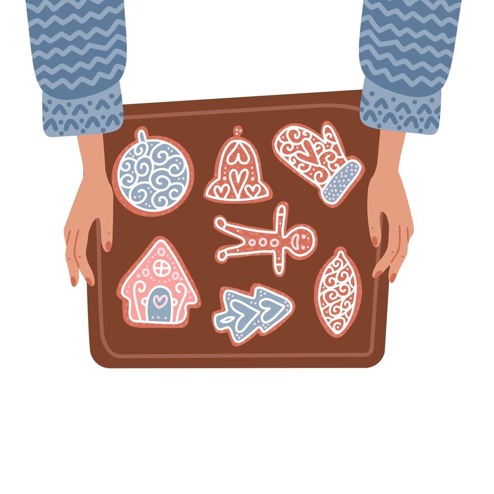 twee vrouwelijke handen met bakplaat met peperkoek kerstkoekjes. bovenaanzicht geïsoleerd concept. platte vectorillustratie van wintervakantie traditionele gerechten. vector
