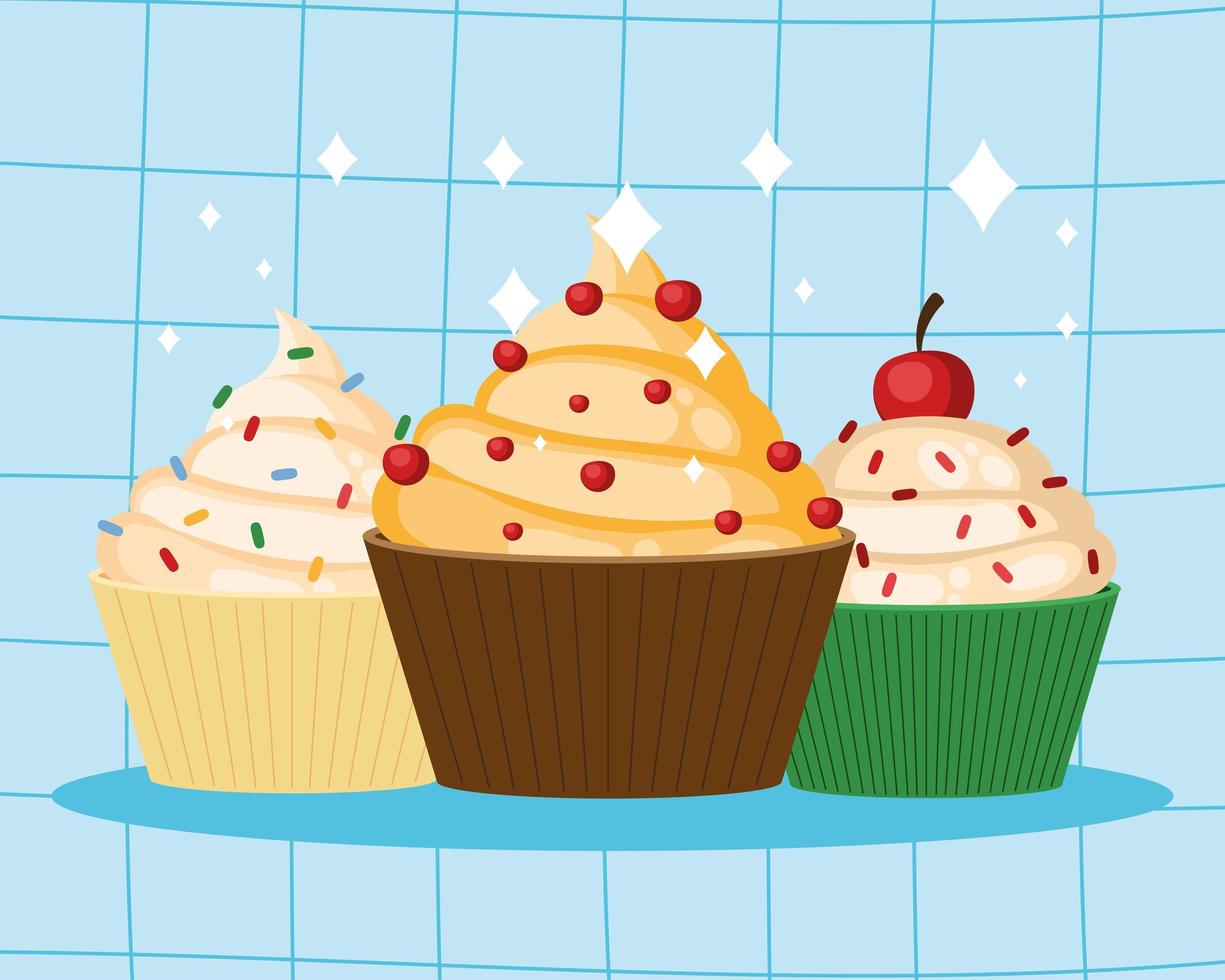 drie heerlijke cupcakes vector