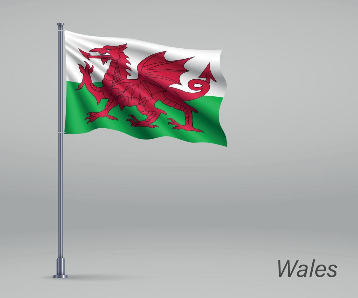 wapperende vlag van wales - grondgebied van het verenigd koninkrijk op vlaggenmast. vector