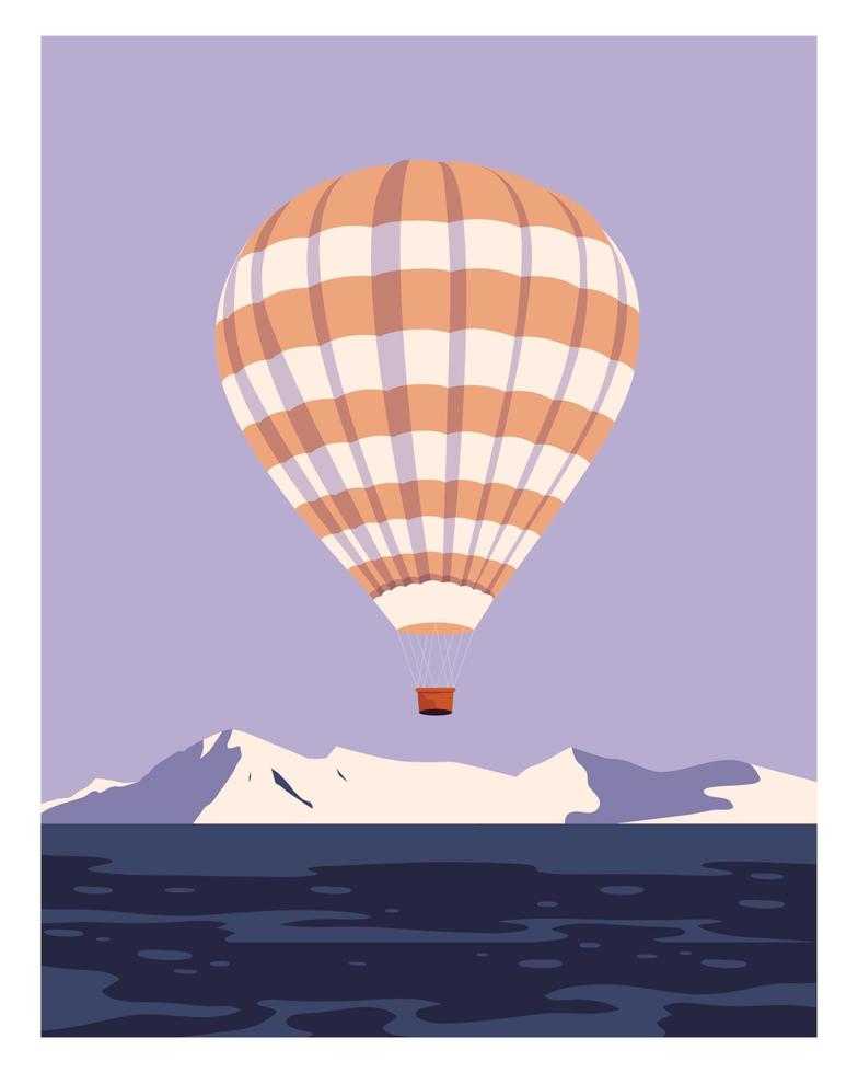 heteluchtballon die over bergen en zee vliegt vector