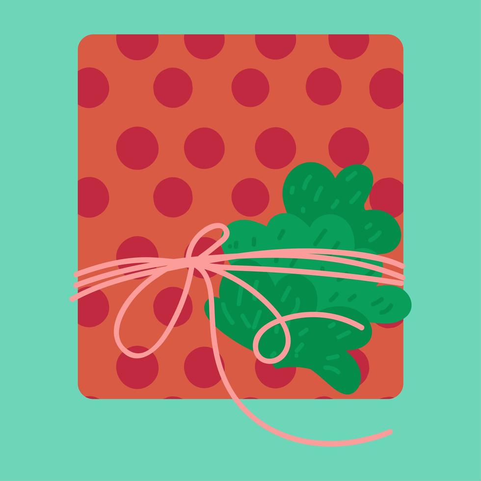 kerstcadeau in inpakpapier platte vectorillustratie vector