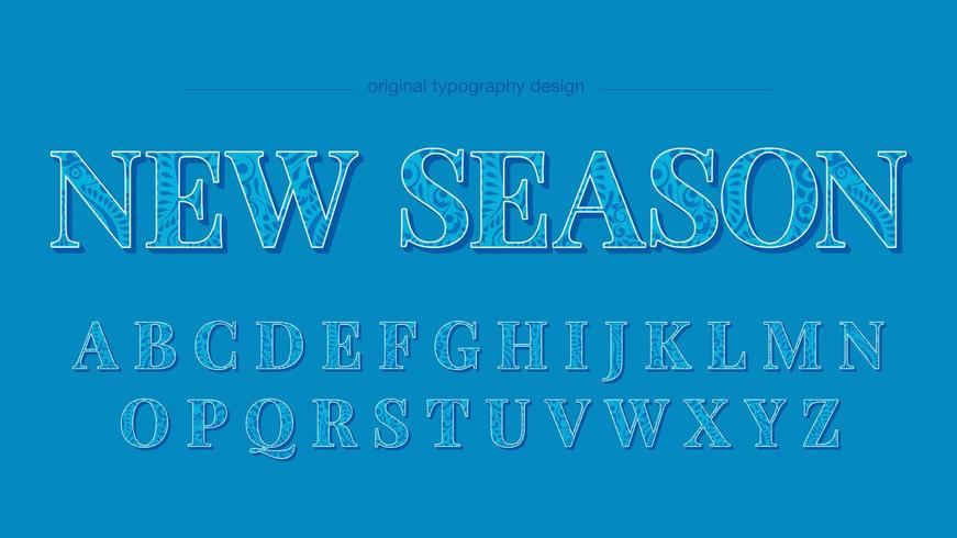 Blauwe bloemenpatroon hoofdletters typografie vector