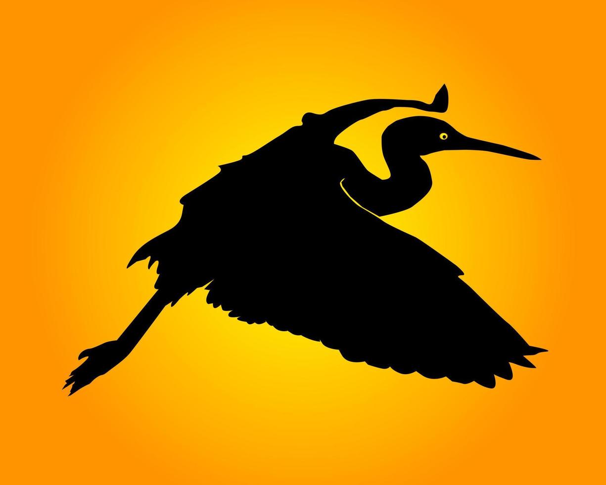 zwart silhouet van een reiger op een oranje achtergrond vector