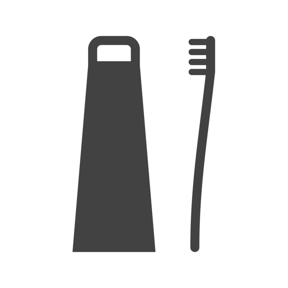 tandenborstel en tandpasta glyph zwart pictogram vector