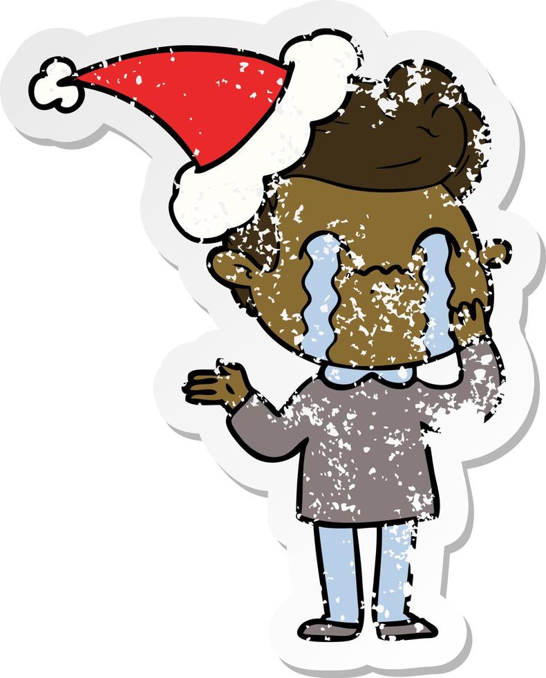 verontruste sticker cartoon van een huilende man met een kerstmuts vector