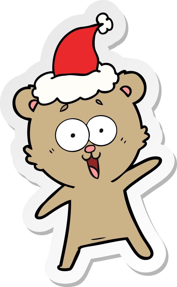 lachende teddybeer sticker cartoon van een dragende kerstmuts vector