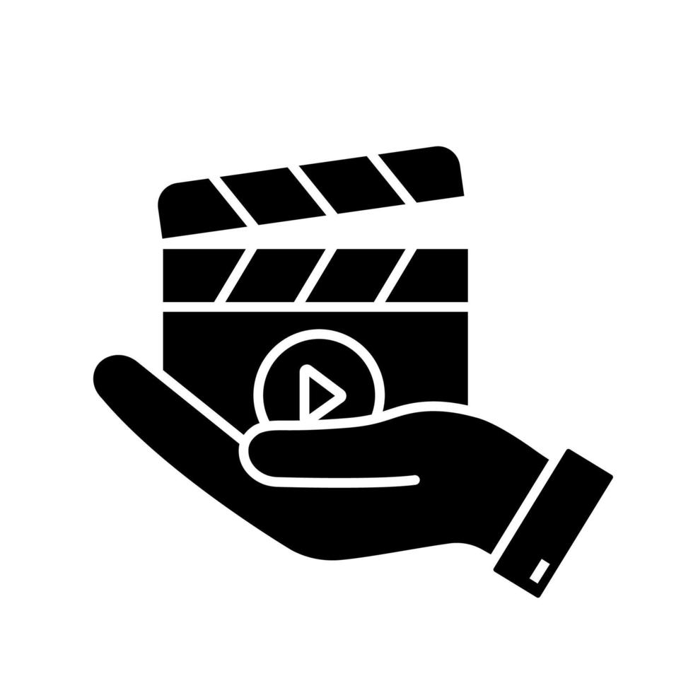 film release glyph icoon. video productie. cinematografie. hand met Filmklapper. film regisseur. silhouet symbool. negatieve ruimte. vector geïsoleerde illustratie