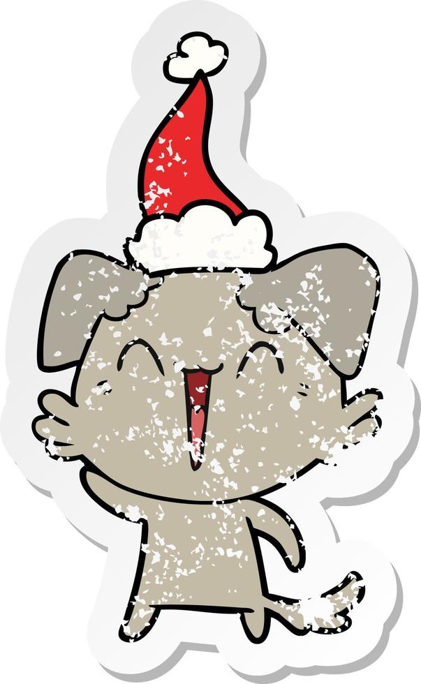 zwaaiende kleine hond verontruste sticker cartoon van een dragende kerstmuts vector