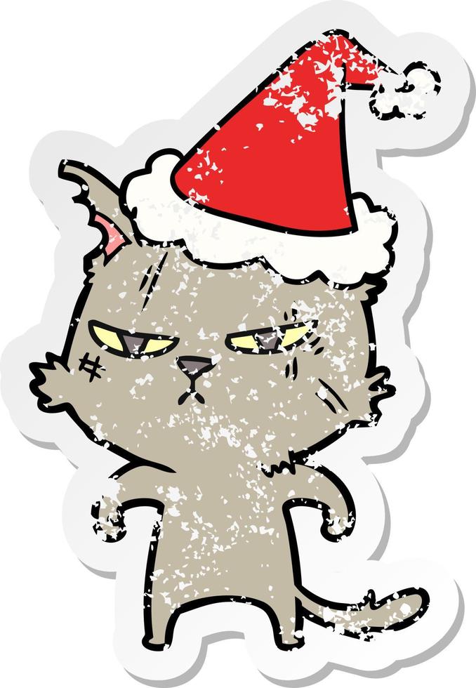 stoere, verontruste stickercartoon van een kat met een kerstmuts vector