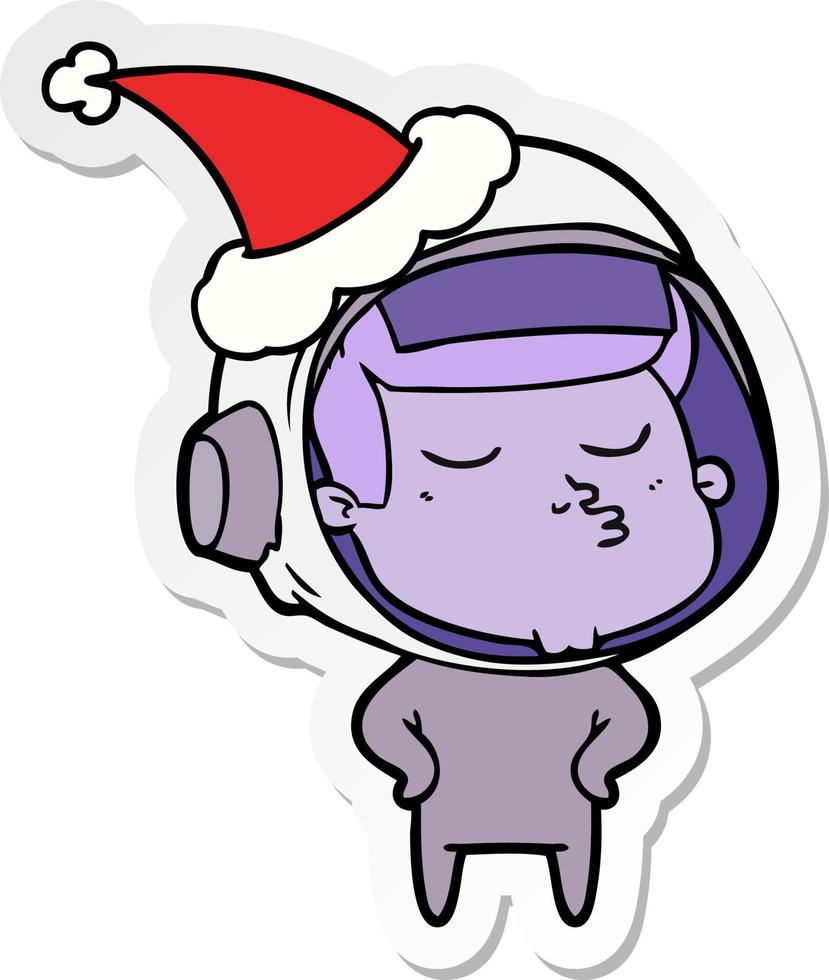 stickercartoon van een zelfverzekerde astronaut met een kerstmuts vector