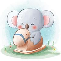 schattige baby koala spelen met houten piqqy vector