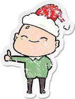 vrolijke, verontruste stickercartoon van een kale man met een kerstmuts vector