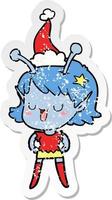 gelukkig buitenaards meisje verontruste sticker cartoon van een dragende kerstmuts vector