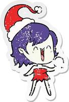 schattige, verontruste stickercartoon van een gelukkig vampiermeisje met een kerstmuts vector